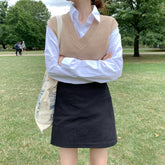 Suéter liso con cuello en V y chaleco de punto